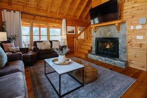 Smart TV, fireplace, table football, books