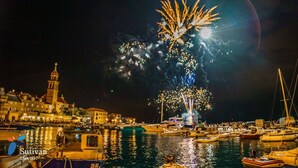 A harbor at night with fireworks, boats, and buildings. - Pirka - Apt. w. Terrace & sea View,2 min to Beach (Sutivan)