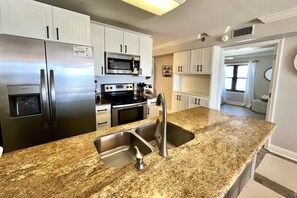 Condo, 3 Bedrooms | Private kitchen | Fridge, oven, coffee/tea maker, toaster