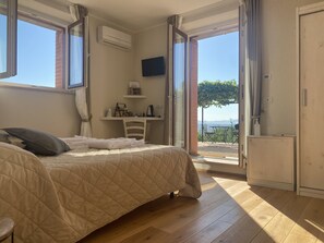 2 bedrooms, in-room safe, iron/ironing board, WiFi