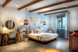 A bedroom with a wooden bed, a desk, a chair, and a large mirror. - Carpe Diem Boutique Hotel - Adults Only (Manavgat)