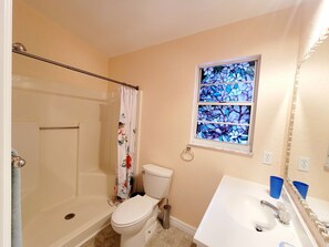 Shower, hair dryer, towels, soap