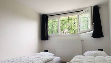 2 chambres, fer et planche à repasser, lit parapluie, accès Internet