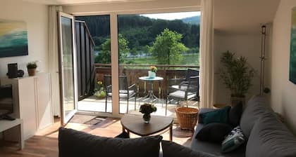 Vacation apartment with lake view and close to the ski slopes