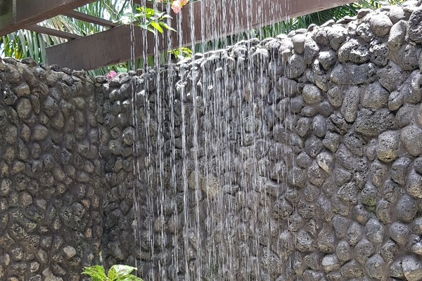 Private Outdoor rain head shower, a relaxing sensation of standing in nature