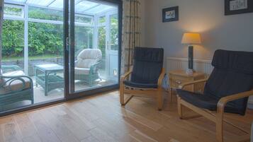 House (3 Bedrooms) | Living area | 32-inch TV with cable channels