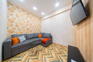 Apartment | Wohnbereich | LCD-Fernseher, aktuelle Filme, Pay-TV, Streaming-Dienste