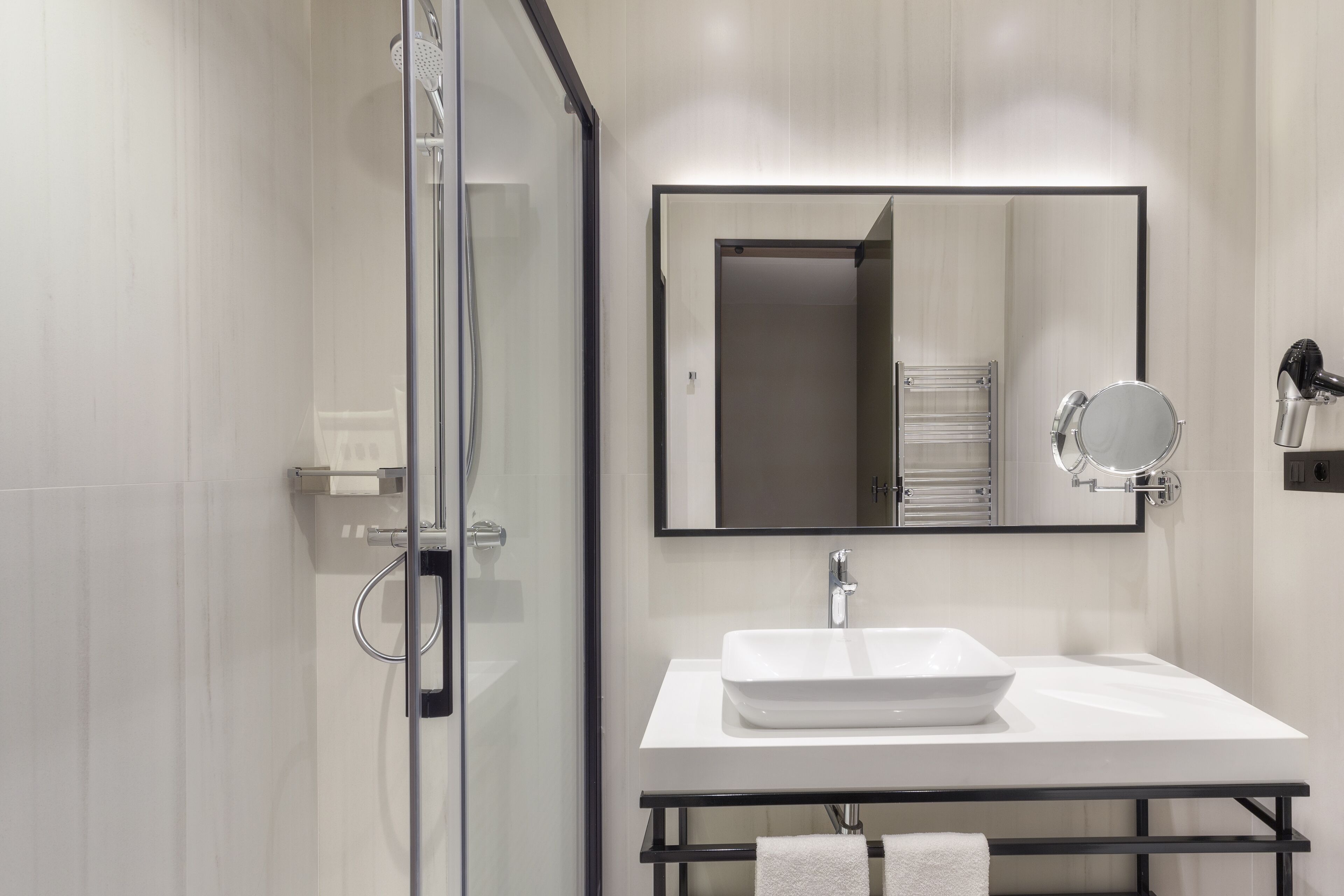 eco-friendly toiletries, hair dryer, towels, soap