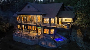 Relax on the spacious patio with a fire pit, or enjoy the heated pool and scenic views from the large windows and balconies.
