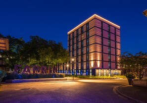 A modern building with a prominent entrance and the name 'FABRINI' displayed. - unique by ATLANTIC Hotels Bremen (Bremen)