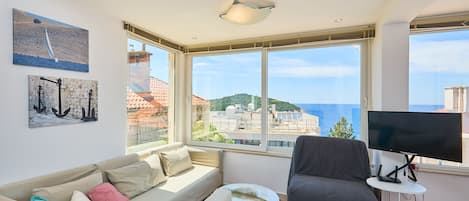 City-Apartment (2 Bedrooms) | Wohnzimmer | Fernseher