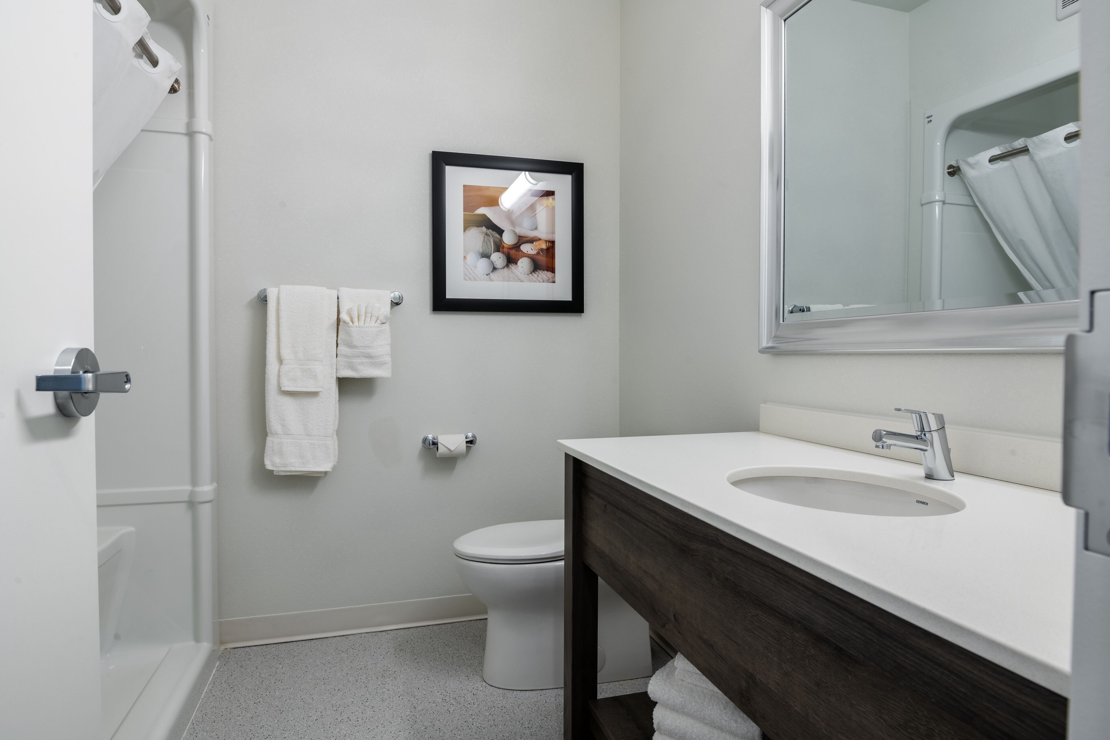 rainfall showerhead, hair dryer, towels, soap