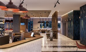 A modern bar area with a long counter, multiple pendant lights, and a city view through large windows. - Holiday Inn Express Melbourne Little Collins by IHG (Melbourne)