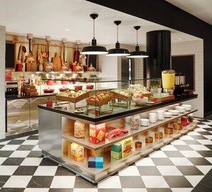 Daily buffet breakfast (USD 22 per person)