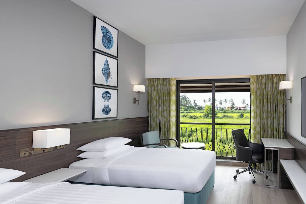 Premium bedding, down comforters, memory foam beds, in-room safe