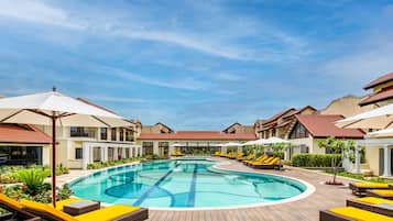 Outdoor pool, open 6:30 AM to 8:00 PM, pool umbrellas, pool loungers