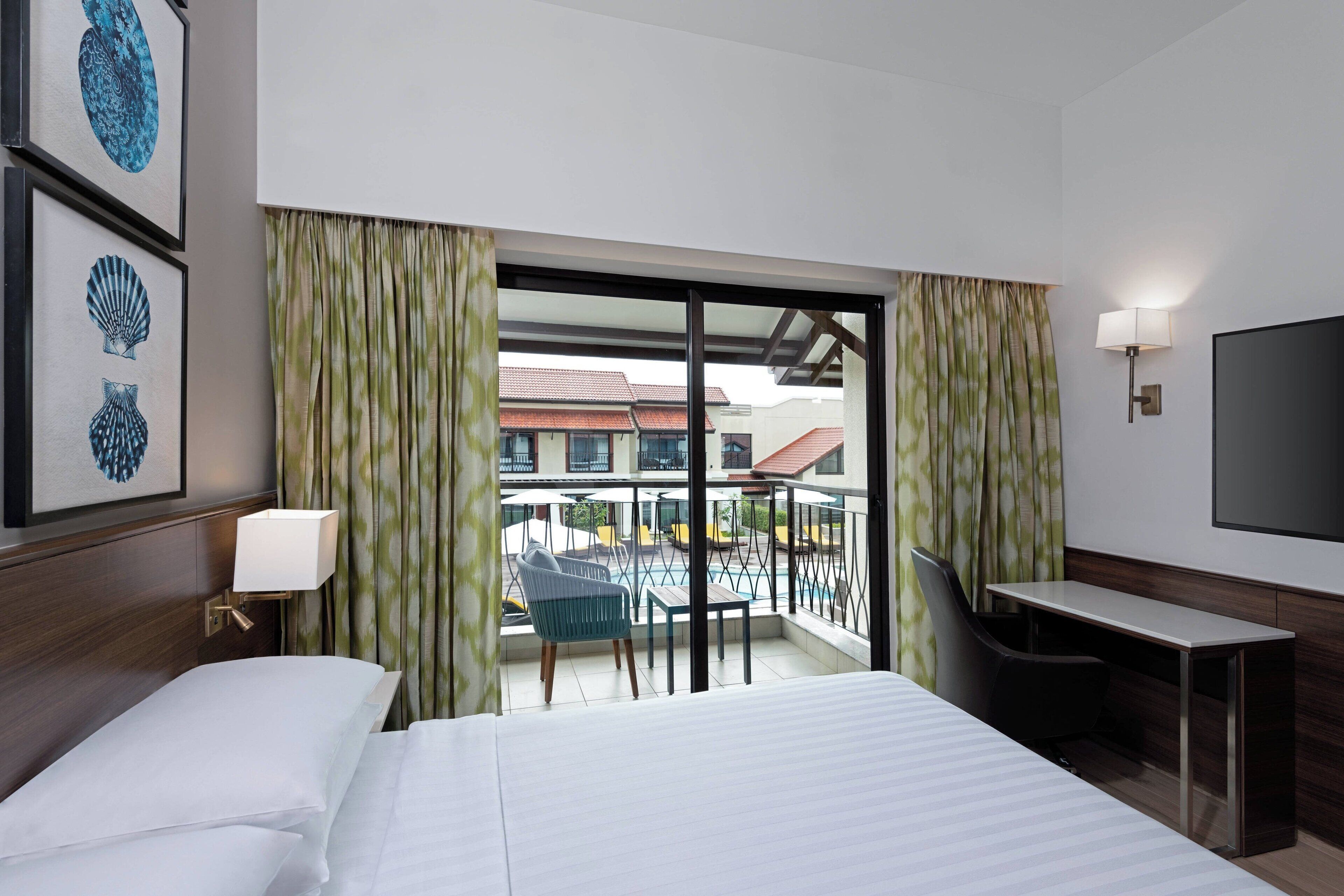 deluxe room, 1 queen bed, non smoking, pool view | pool | outdoor pool, open 6:30 am to 8:00 pm, pool umbrellas, pool loungers
