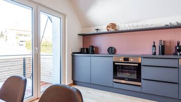 Appartement Duplex | Cuisine privée | Grand réfrigérateur, four, plaque de cuisson, lave-vaisselle