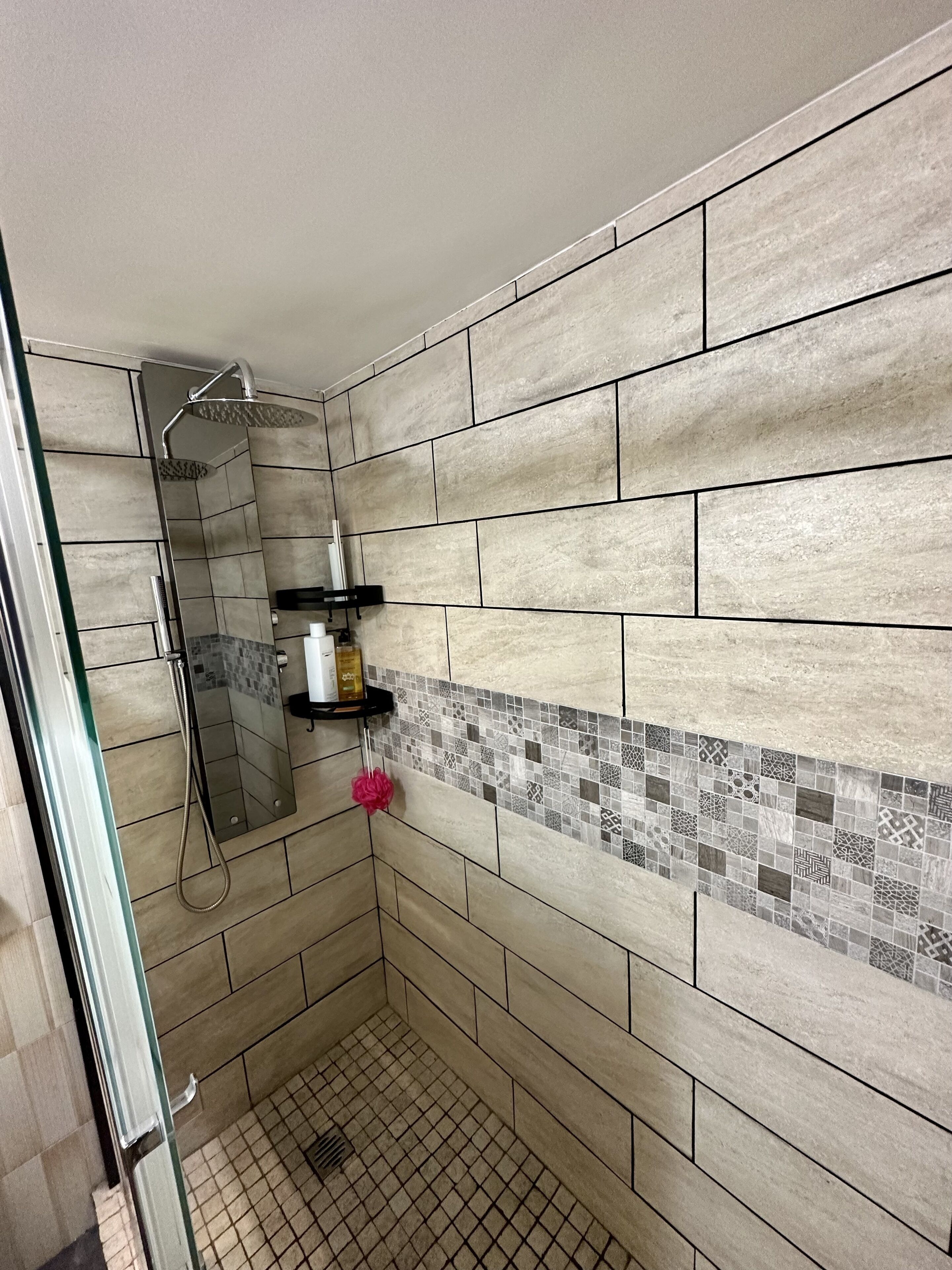 Combined shower/tub, hair dryer, towels, soap