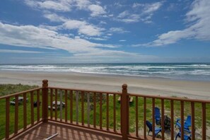 On the beach, sun loungers, beach towels