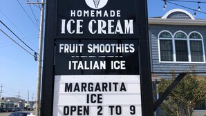 A sign for Ship Bottom, offering homemade ice cream, fruit smoothies, Italian ice, margarita ice, and vegan flavors, open from 2 to 9. - Adorable 2BR Condo on Long Beach Island LBI  in Ship Bottom. Beach Block! (Ship Bottom)