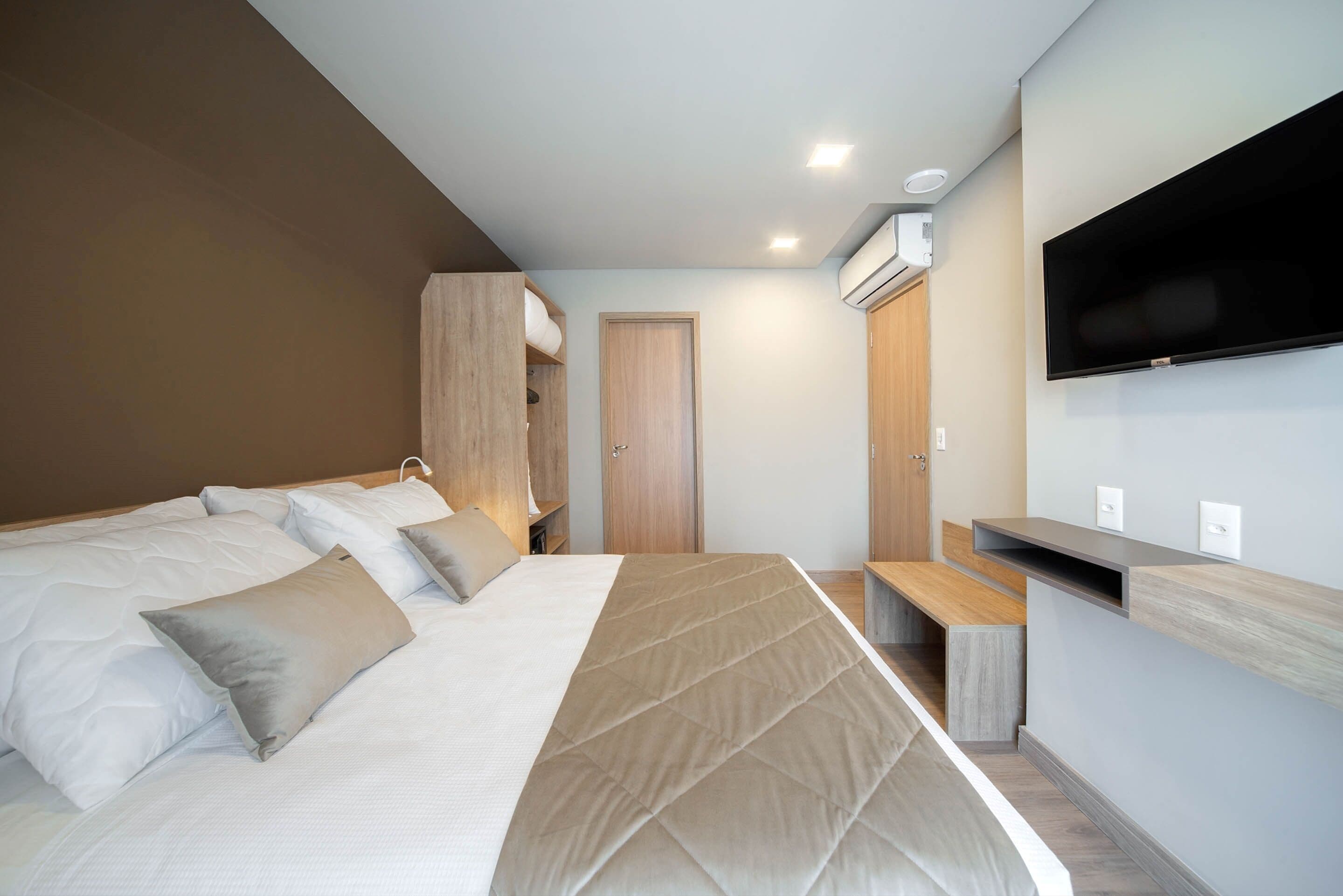 Quarto quádruplo família | Frigobar, Wi-Fi de cortesia, roupa de cama