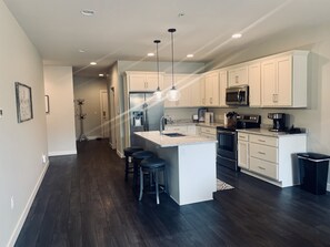 Fridge, microwave, oven, stovetop - The Condo at the Park: Your Home Base to Fun! Adventure awaits at Arnolds Park. (Arnolds Park)