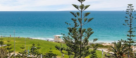 On the beach, sun-loungers, beach towels