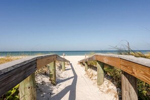 On the beach, sun-loungers, beach towels