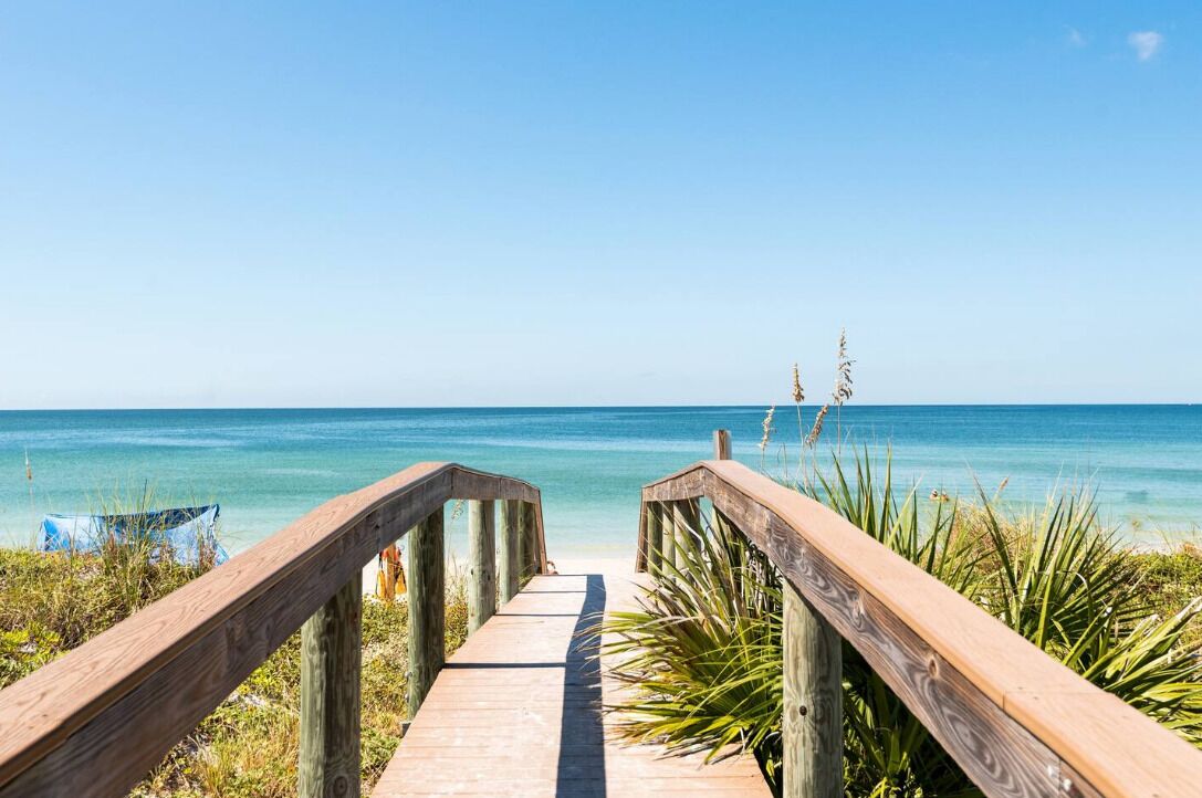 On the beach, sun loungers, beach towels