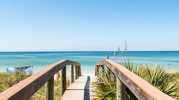 On the beach, sun loungers, beach towels