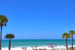 On the beach, sun-loungers, beach towels