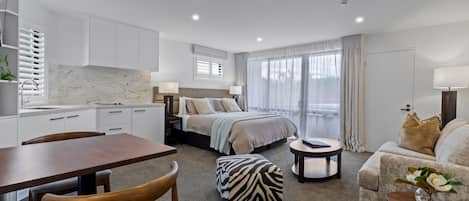 Studio Apartments | Premium bedding, down duvets, pillow-top beds, in-room safe