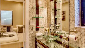 Bathtub, hair dryer, towels, soap