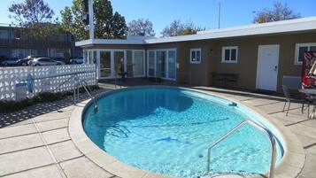 Seasonal outdoor pool, open 9:00 AM to 8:00 PM, sun loungers