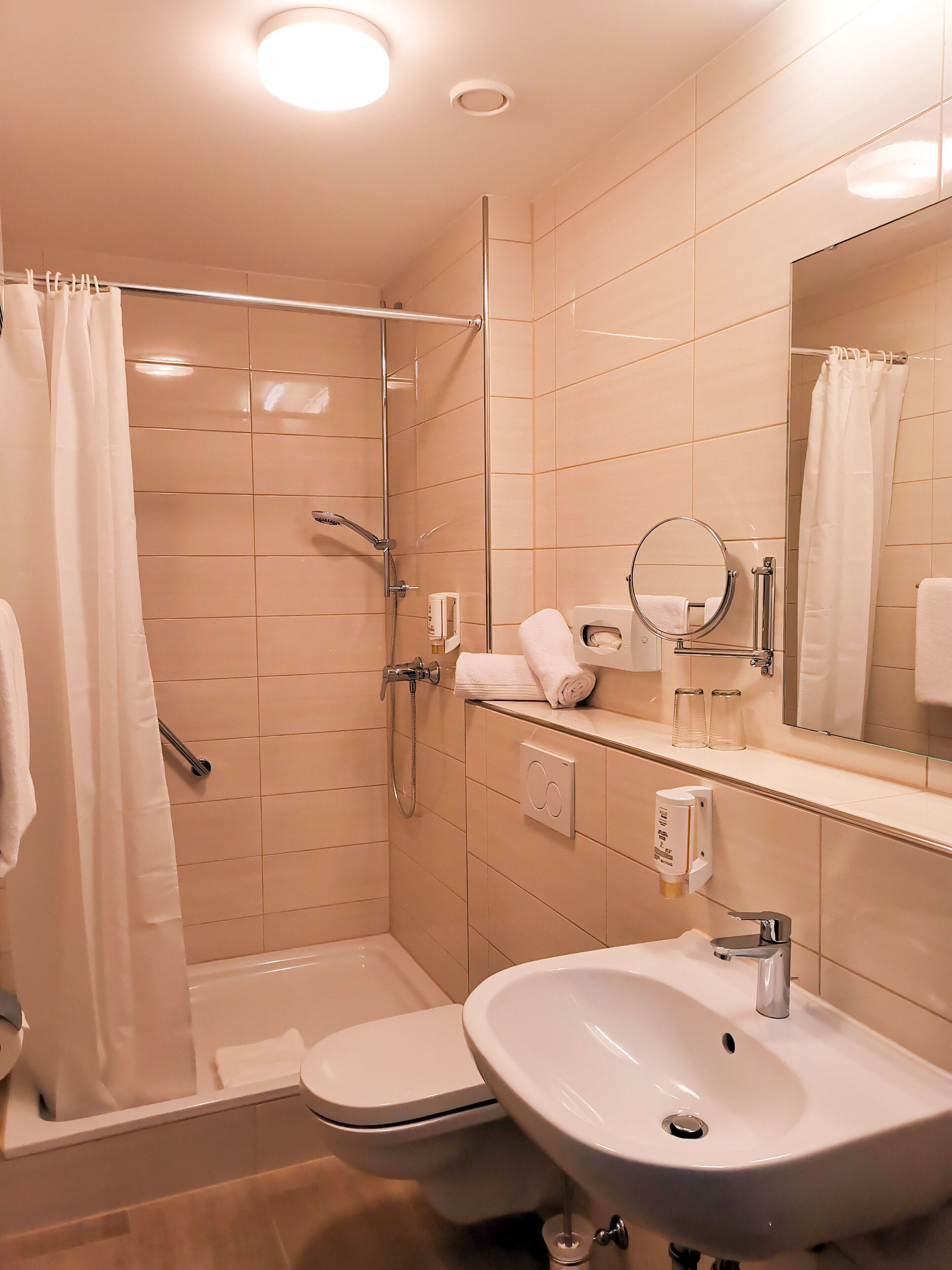 comfort double room | bathroom | hair dryer, towels