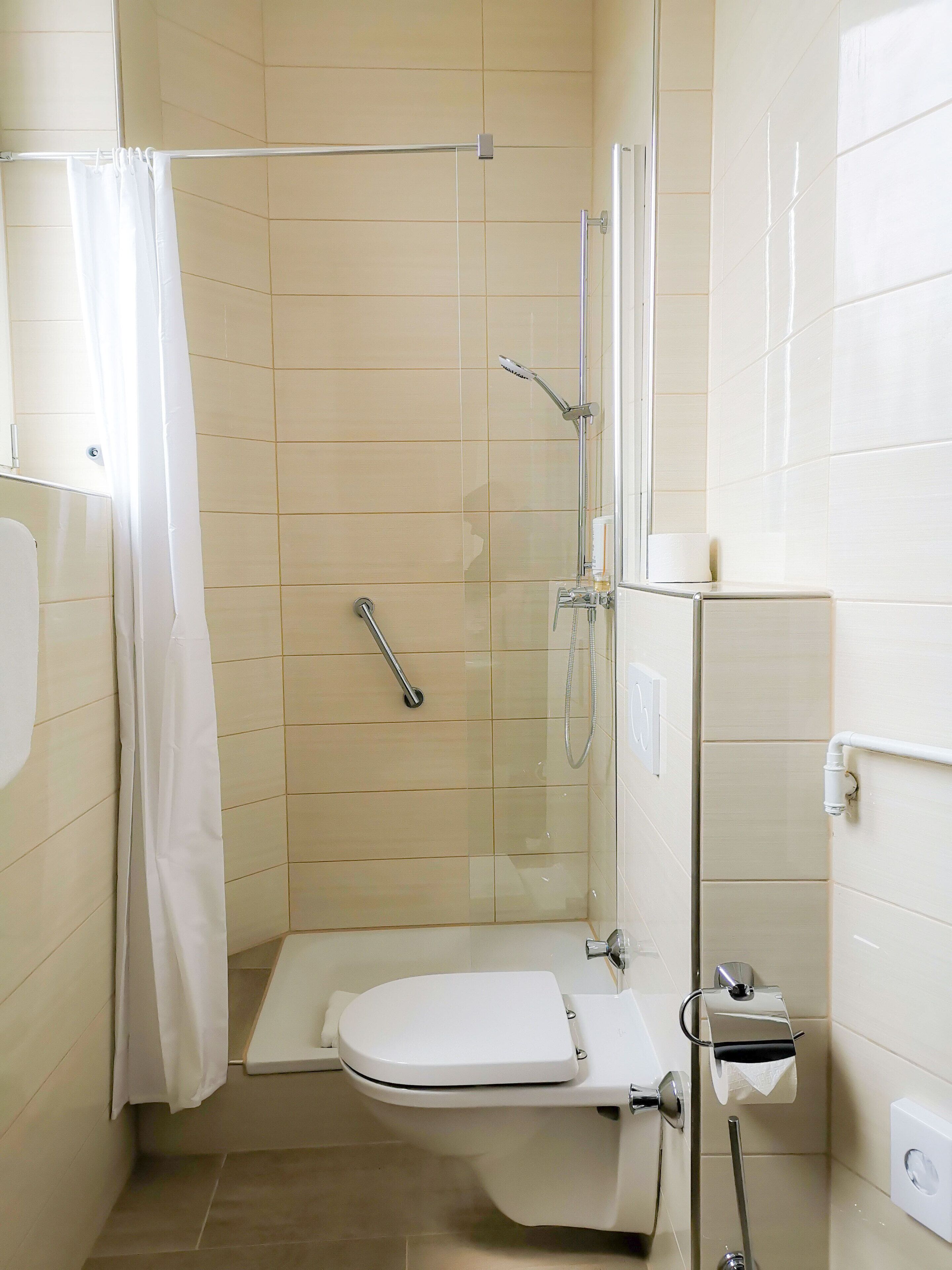 comfort single room | bathroom | hair dryer, towels