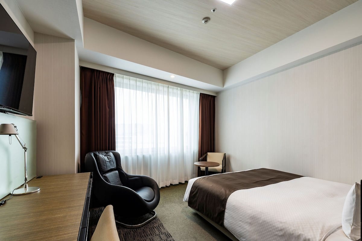 Down comforters, desk, laptop workspace, blackout drapes