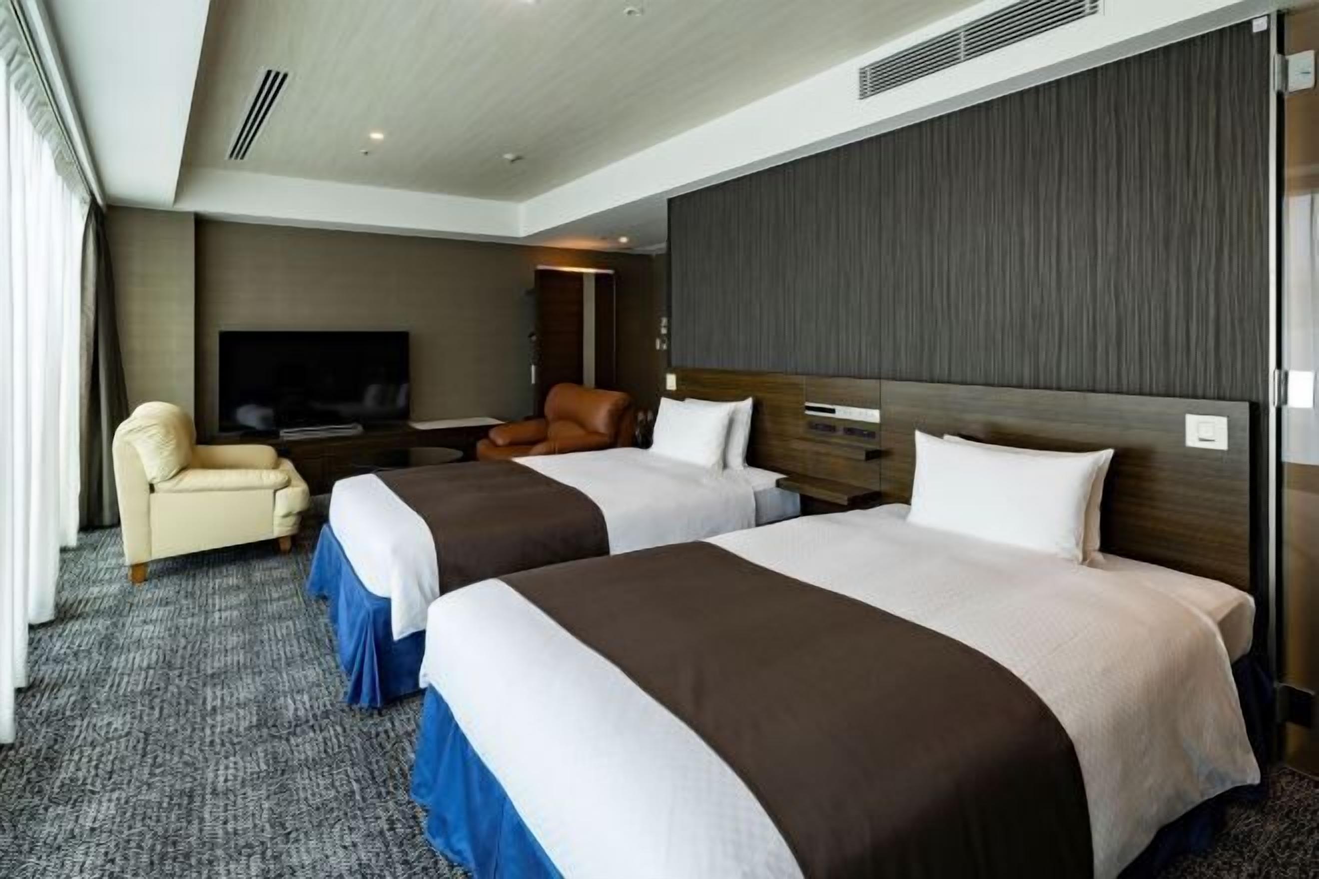 Down duvets, desk, laptop workspace, blackout curtains