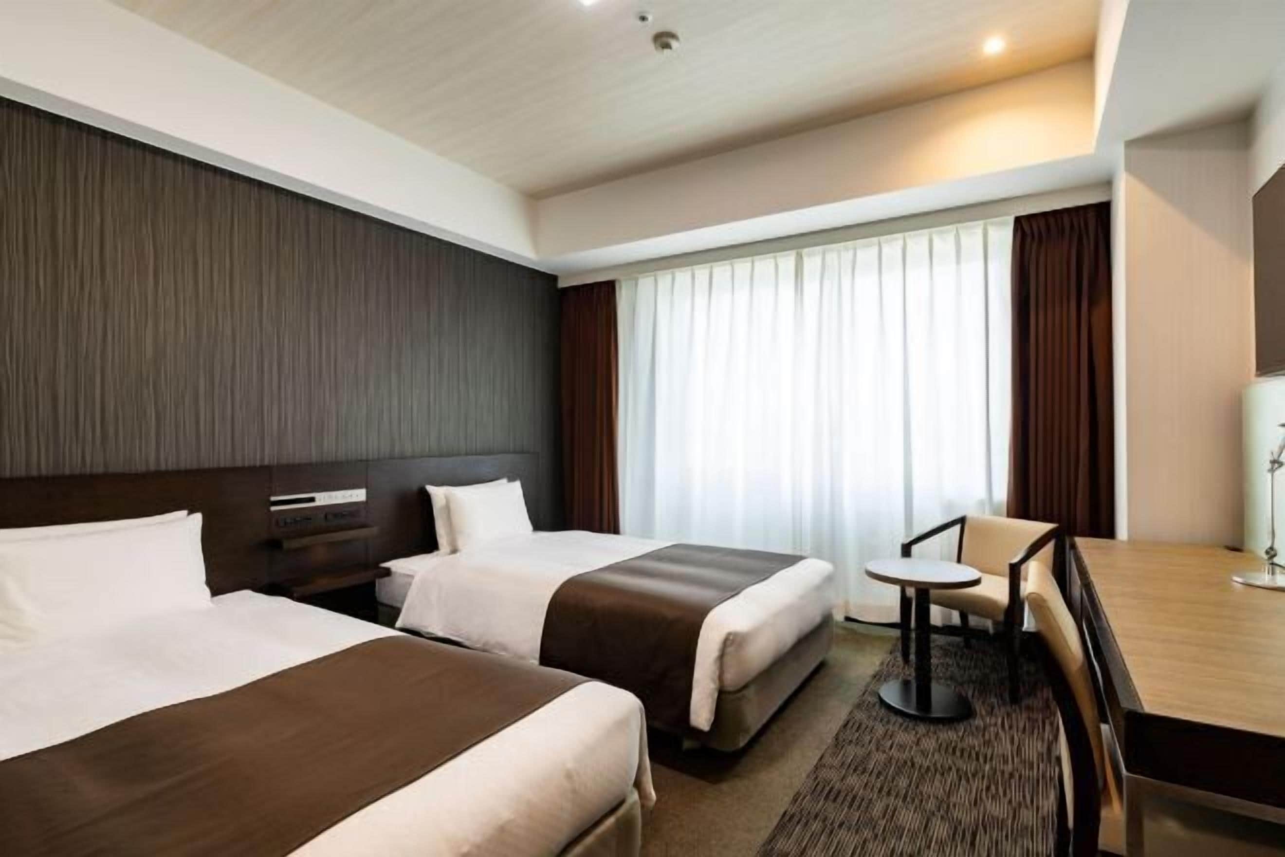 Down duvets, desk, laptop workspace, blackout curtains