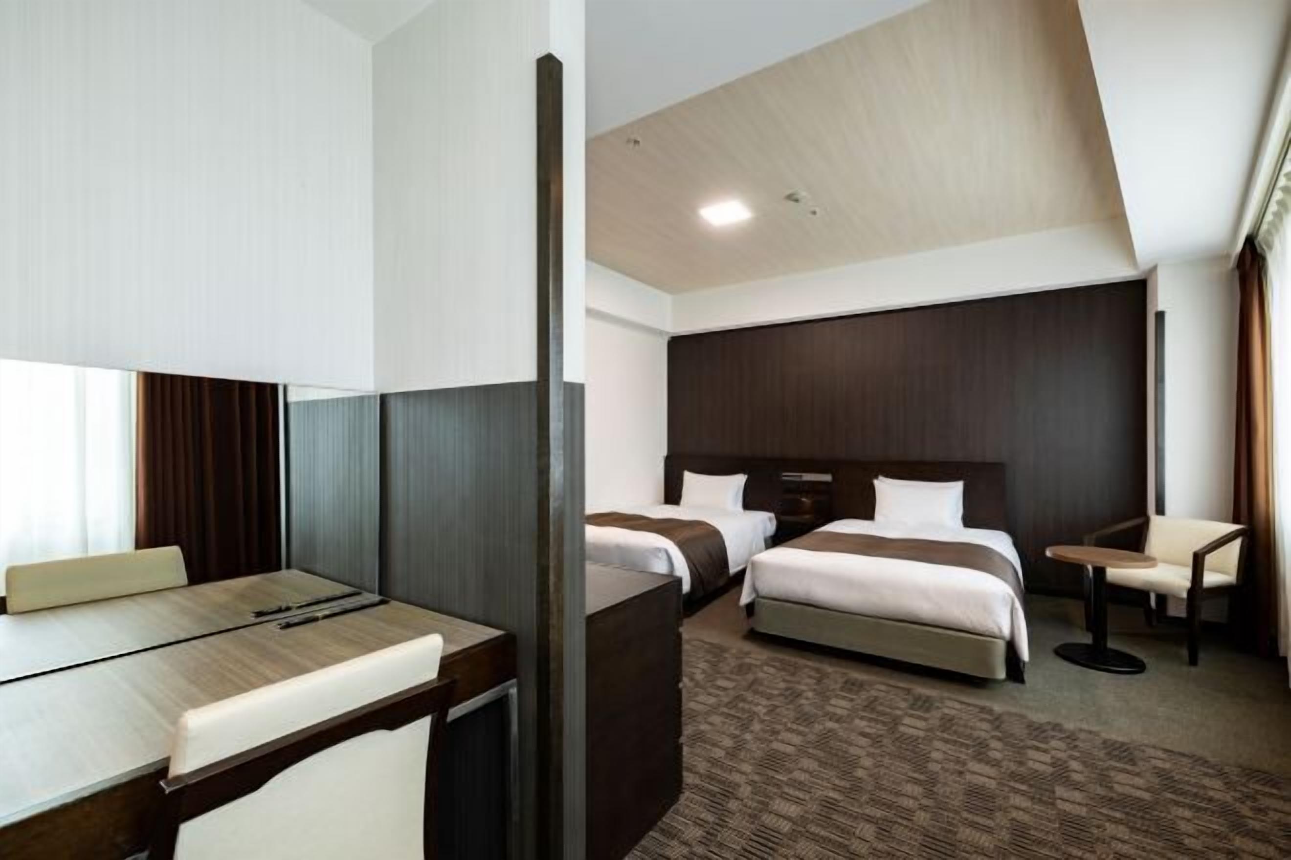 Down duvets, desk, laptop workspace, blackout curtains