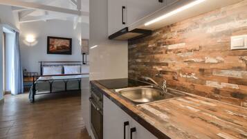 Villa | Private kitchen | Fridge, microwave, oven, stovetop