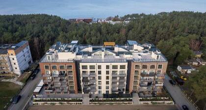 Na Wydmach A26 Międzywodzie | Familienapartment in Strandnähe | Parkplatz & Balkon | Stilvolle Innenausstattung