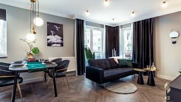 Apartemen Eksklusif | Ruang keluarga | Televisi LED 32-inci dengan saluran TV kabel dan TV