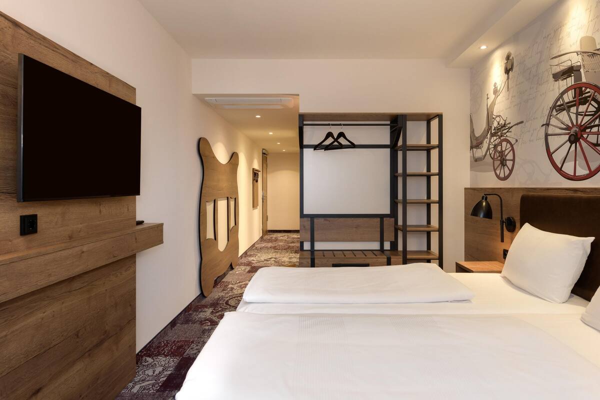 family room, multiple beds | in-room safe, desk, soundproofing, free cots/infant beds