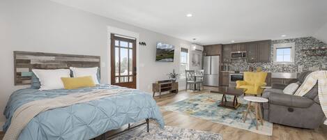 1 bedroom, desk, iron/ironing board, travel crib