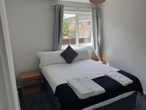 Casa | 3 habitaciones, tabla de planchar con plancha y wifi gratis 