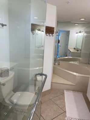 Bathtub, hair dryer, towels, soap