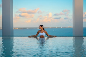 3 outdoor pools, open 8:00 AM to 8:00 PM, pool umbrellas, pool loungers