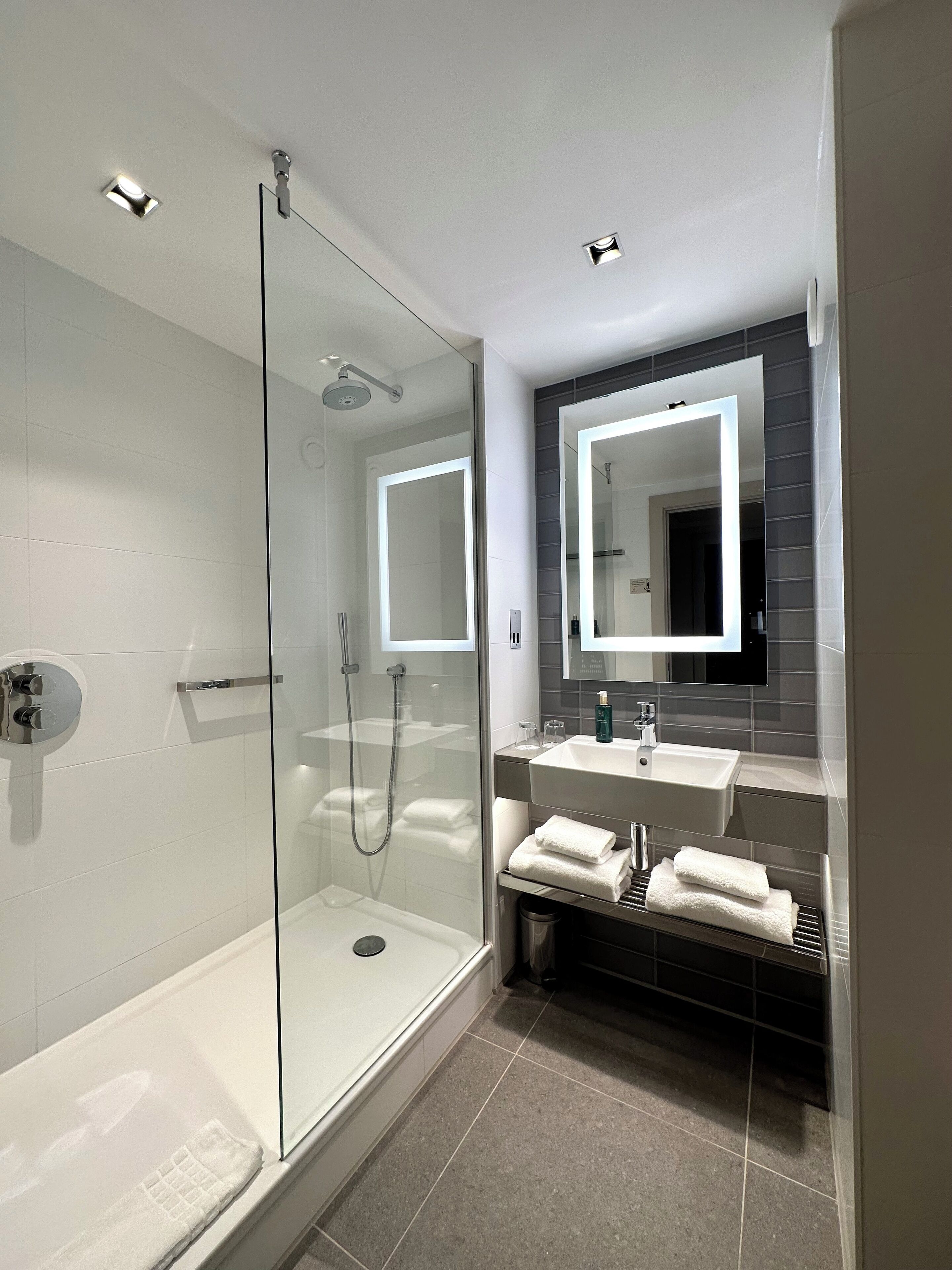 shower, free toiletries, hair dryer, towels